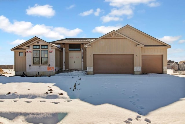 view of front of property with a garage