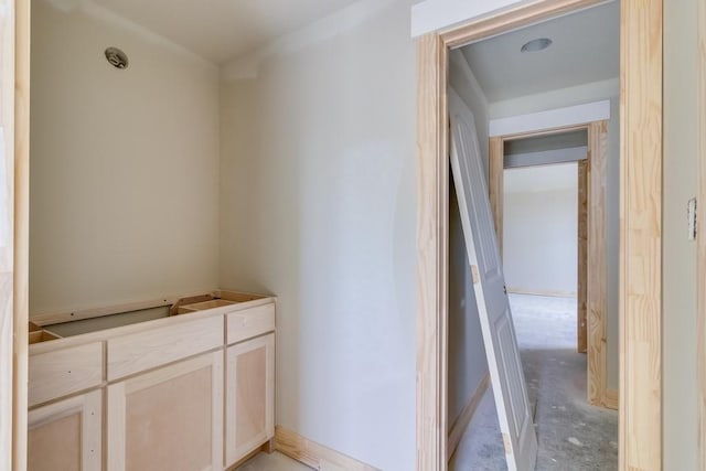 bathroom with concrete flooring