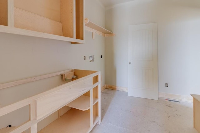 washroom featuring laundry area and electric dryer hookup