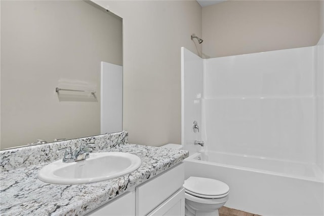 full bathroom featuring vanity, toilet, and shower / bathing tub combination