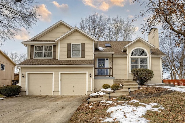 view of front of property with a garage