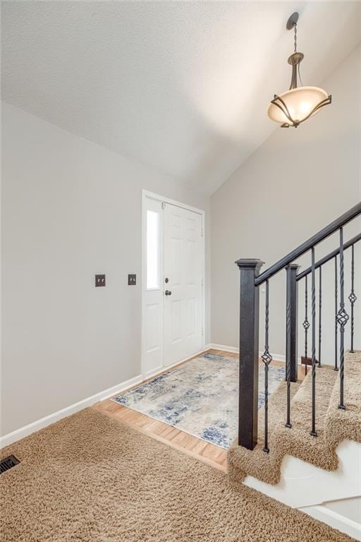 entryway with lofted ceiling