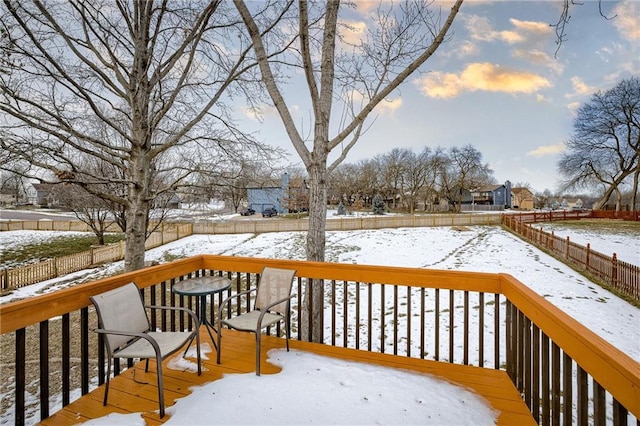 view of snow covered deck