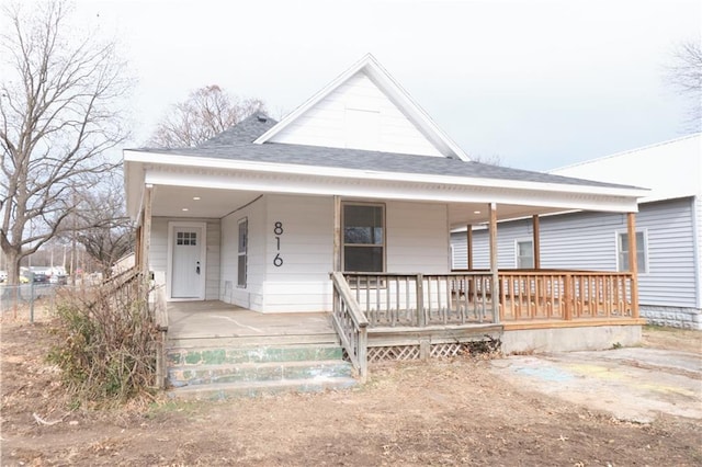 farmhouse inspired home with a porch