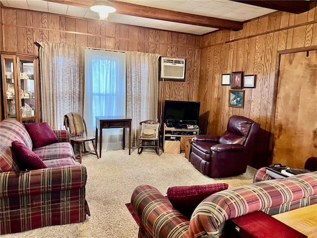 carpeted living room with a wall mounted air conditioner, wooden walls, and beam ceiling