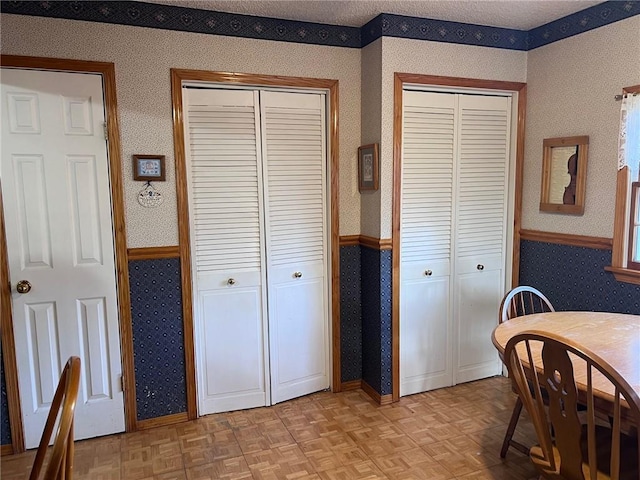 dining room featuring light parquet floors