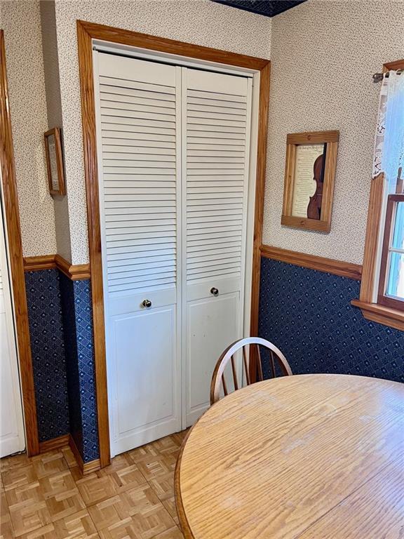 dining room with light parquet flooring