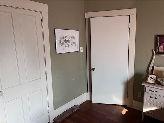 interior space with dark wood-type flooring