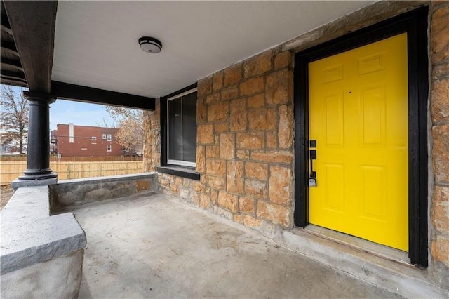 doorway to property with covered porch