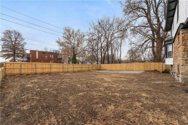 view of yard featuring a fenced backyard