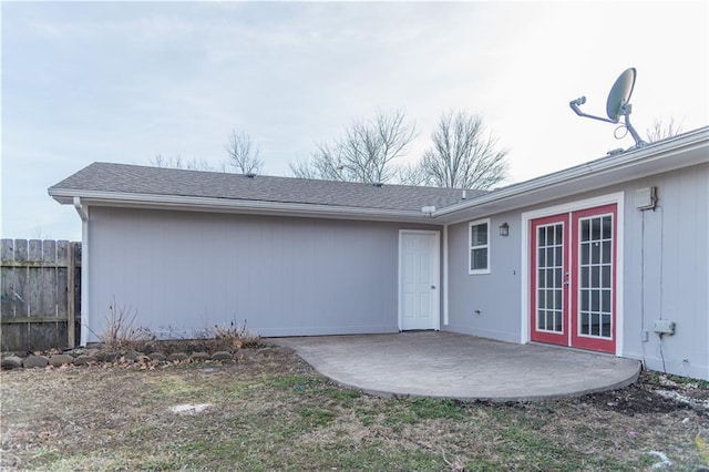 rear view of house with a patio and french doors