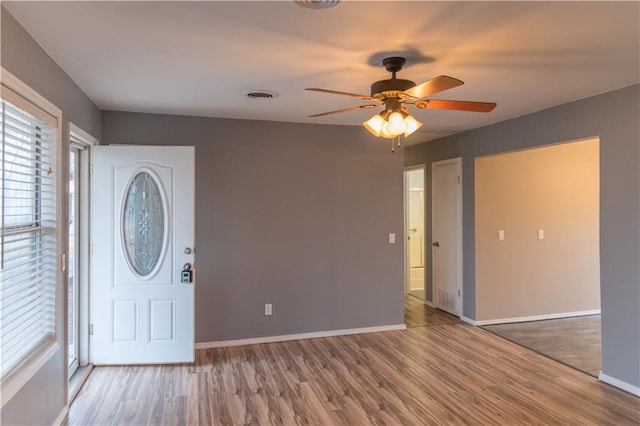 foyer featuring hardwood / wood-style flooring and ceiling fan