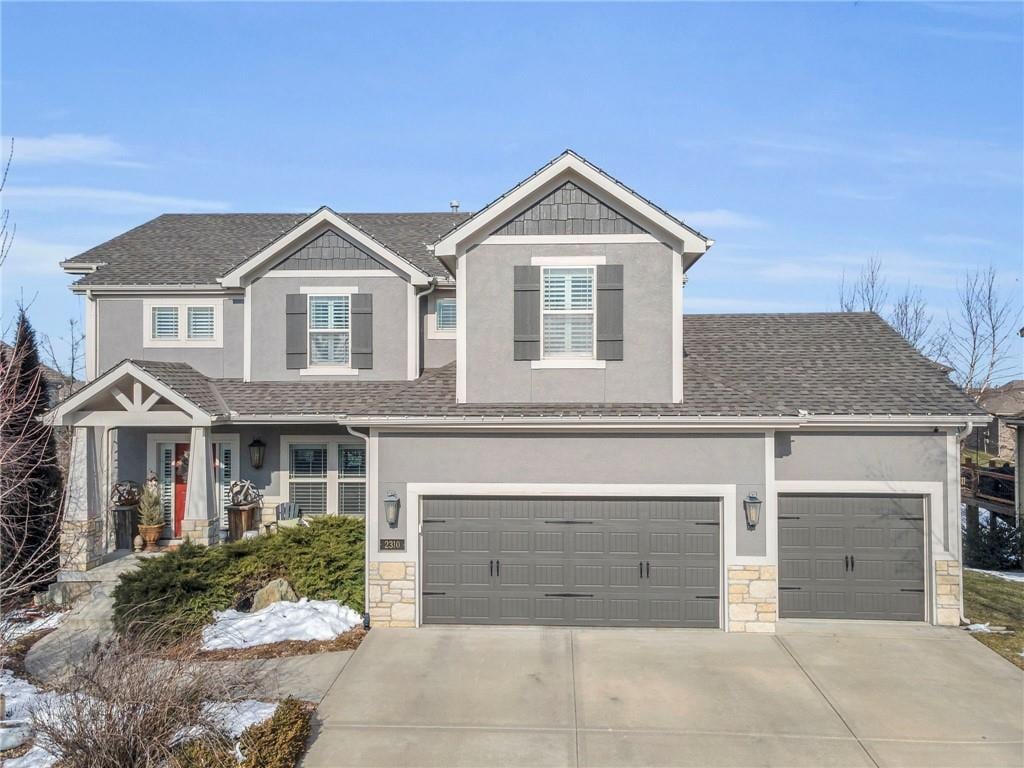 view of front of property featuring a garage