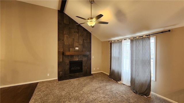 unfurnished living room featuring high vaulted ceiling, a fireplace, carpet flooring, ceiling fan, and beam ceiling