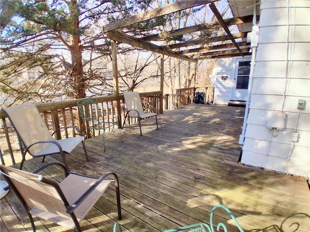 wooden terrace with a pergola