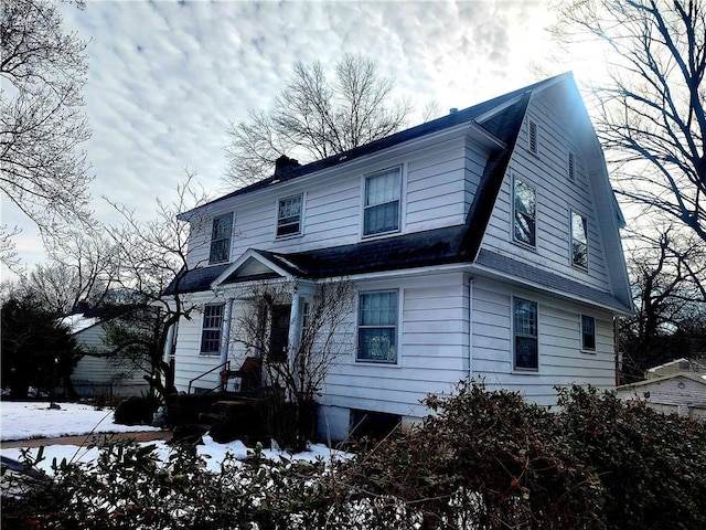 dutch colonial featuring a gambrel roof