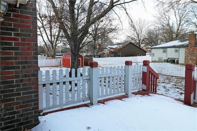 exterior space with a shed