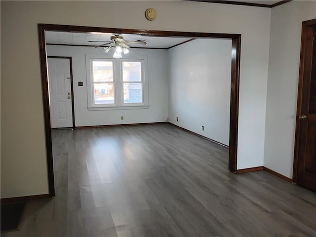 empty room featuring ceiling fan and light hardwood / wood-style flooring