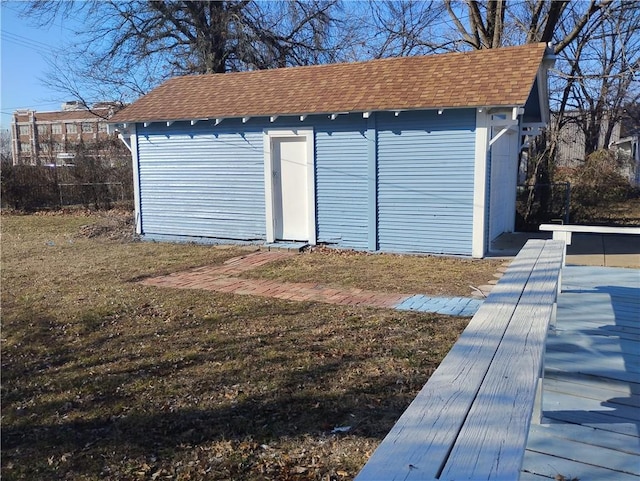 garage with a lawn