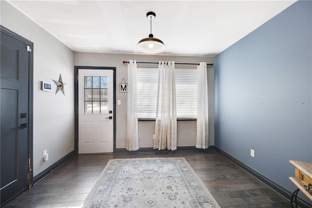 interior space with dark hardwood / wood-style flooring