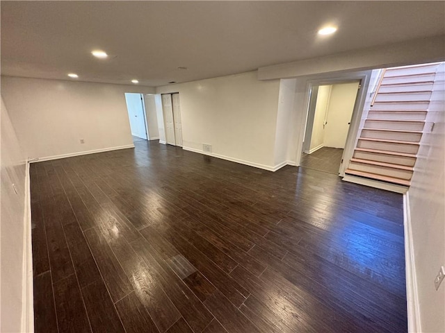 spare room featuring dark hardwood / wood-style floors