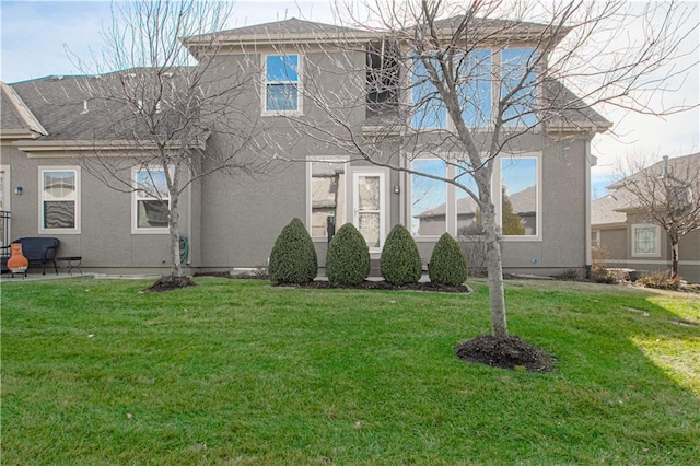 view of front of house with a front lawn