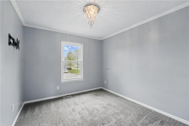 2016 NE Summerfield Ct, Blue Springs, MO 64029 - carpeted empty room with a textured ceiling, ornamental molding, and a chandelier
