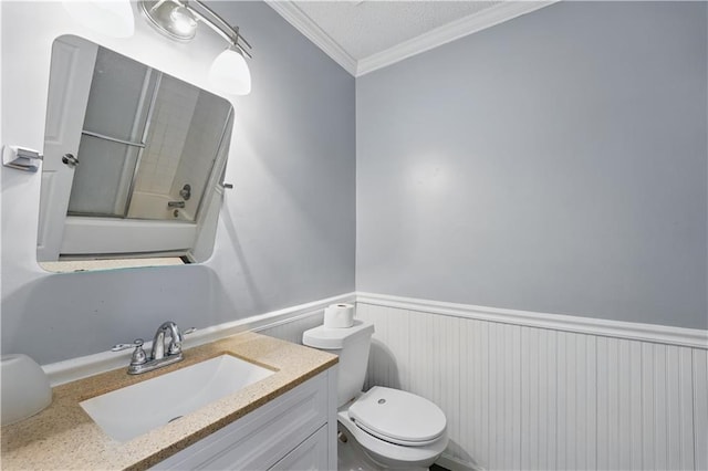 2016 NE Summerfield Ct, Blue Springs, MO 64029 - full bathroom featuring wainscoting, vanity, ornamental molding, and enclosed tub / shower combo