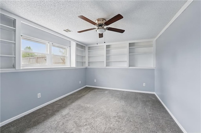 2016 NE Summerfield Ct, Blue Springs, MO 64029 - carpeted empty room featuring ceiling fan and a textured ceiling