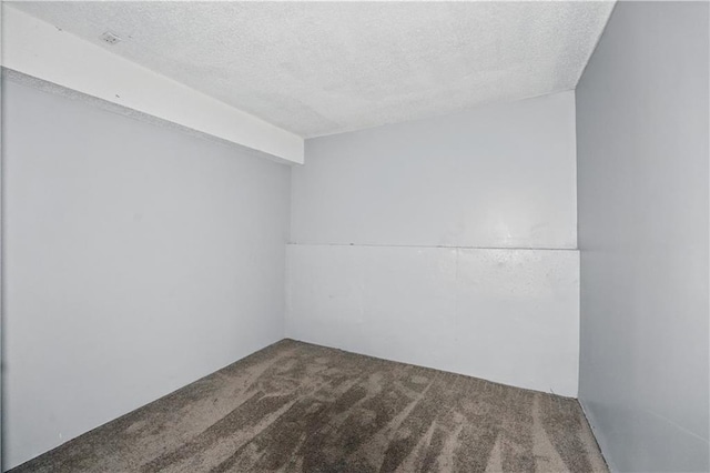 2016 NE Summerfield Ct, Blue Springs, MO 64029 - carpeted empty room with a textured ceiling