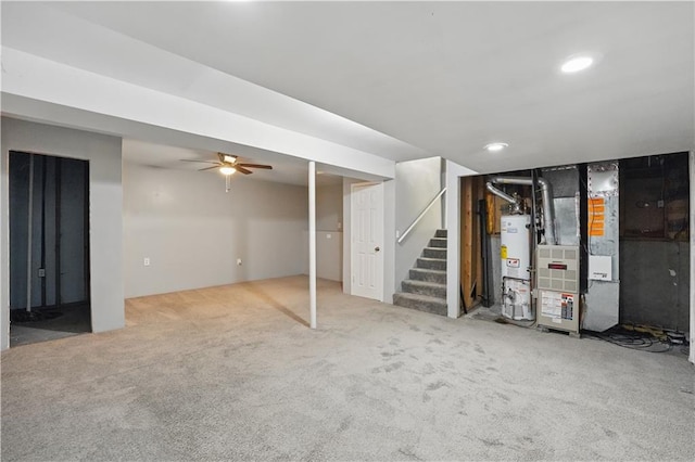2016 NE Summerfield Ct, Blue Springs, MO 64029 - finished below grade area with gas water heater, carpet floors, stairs, heating unit, and recessed lighting