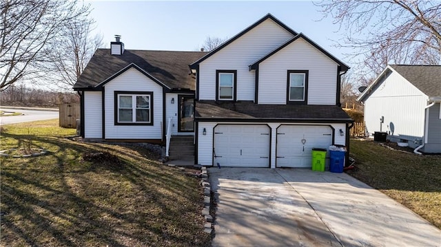 2016 NE Summerfield Ct, Blue Springs, MO 64029 - view of front of house featuring an attached garage, a chimney, a front yard, and driveway