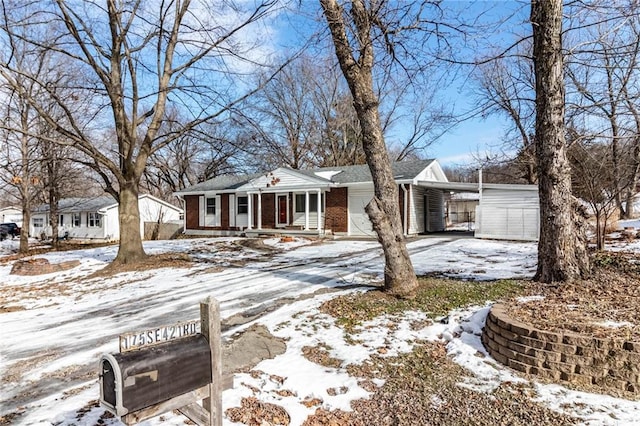 ranch-style home featuring a carport