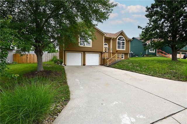 828 SW Harvest Dr, Grain Valley, MO 64029 - view of front facade featuring driveway and an attached garage