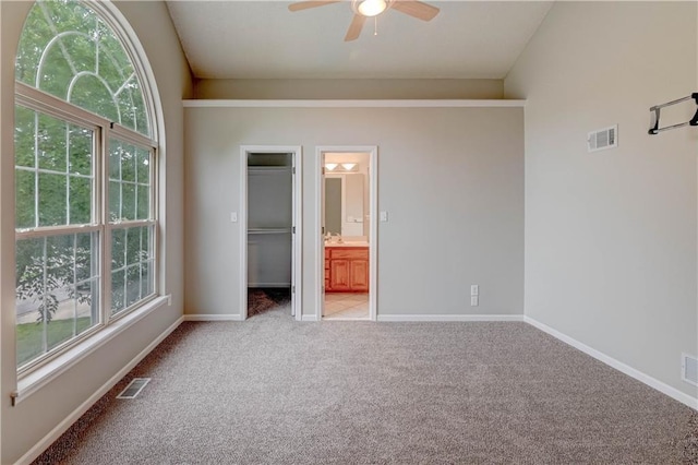 828 SW Harvest Dr, Grain Valley, MO 64029 - empty room with a ceiling fan, light colored carpet, and baseboards
