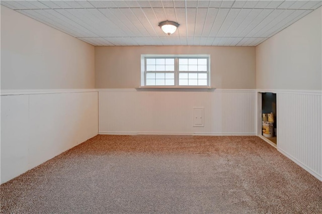 828 SW Harvest Dr, Grain Valley, MO 64029 - unfurnished room featuring wainscoting and carpet