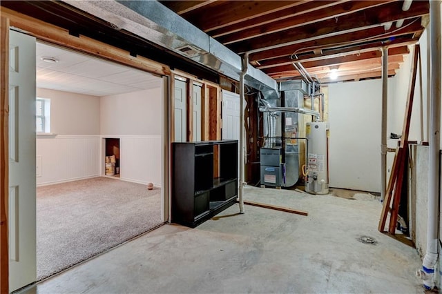 828 SW Harvest Dr, Grain Valley, MO 64029 - basement with gas water heater and wainscoting