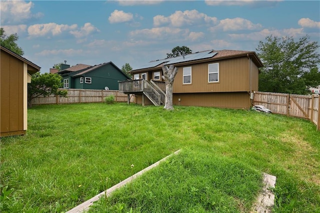 828 SW Harvest Dr, Grain Valley, MO 64029 - view of yard featuring a wooden deck and stairway