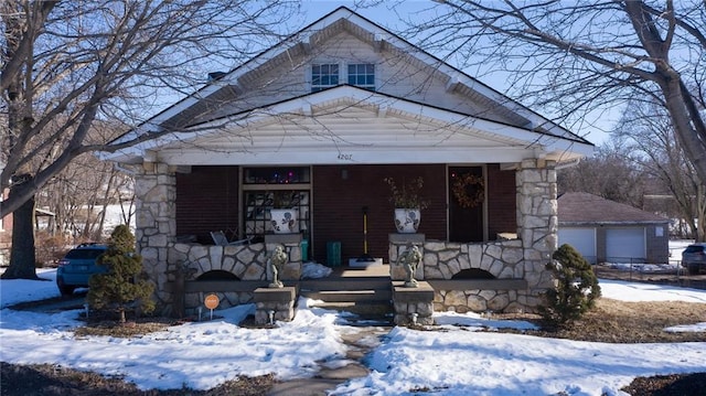 bungalow featuring covered porch