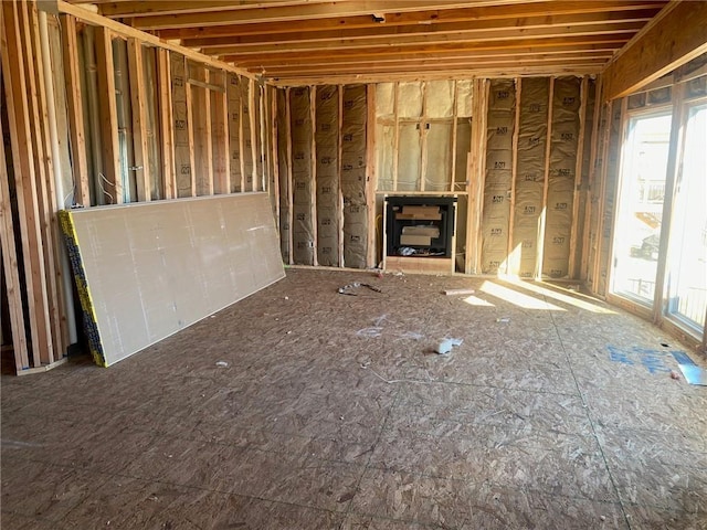 unfurnished living room featuring a healthy amount of sunlight