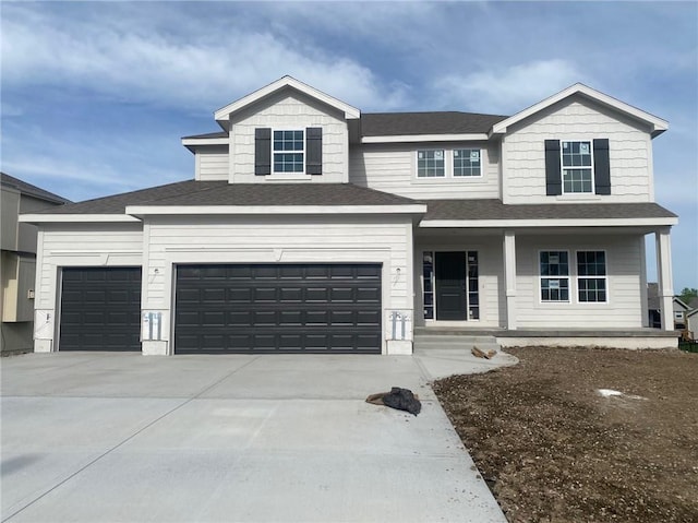 11821 N Bellaire Ave, Kansas City, MO 64156 - view of front of home with driveway, a porch, a garage, and a shingled roof