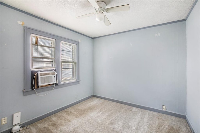 carpeted empty room with cooling unit, crown molding, a textured ceiling, and ceiling fan