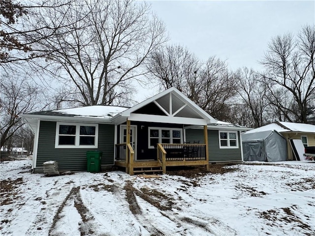 bungalow-style home with a porch