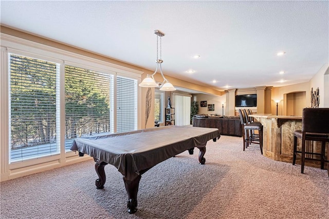 recreation room featuring carpet floors, billiards, and bar area