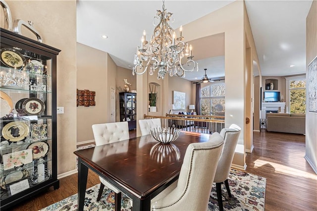 dining room featuring ceiling fan and dark hardwood / wood-style flooring