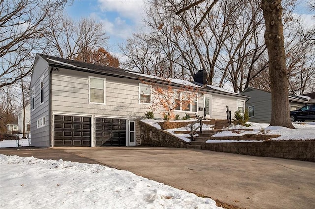 view of front of property featuring a garage