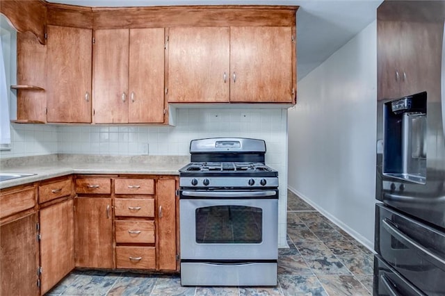 kitchen featuring tasteful backsplash and stainless steel gas stove