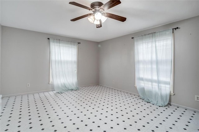 empty room featuring ceiling fan