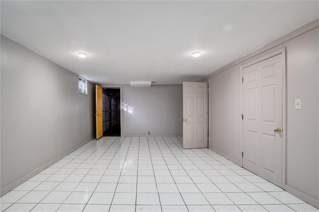 spare room with light tile patterned floors