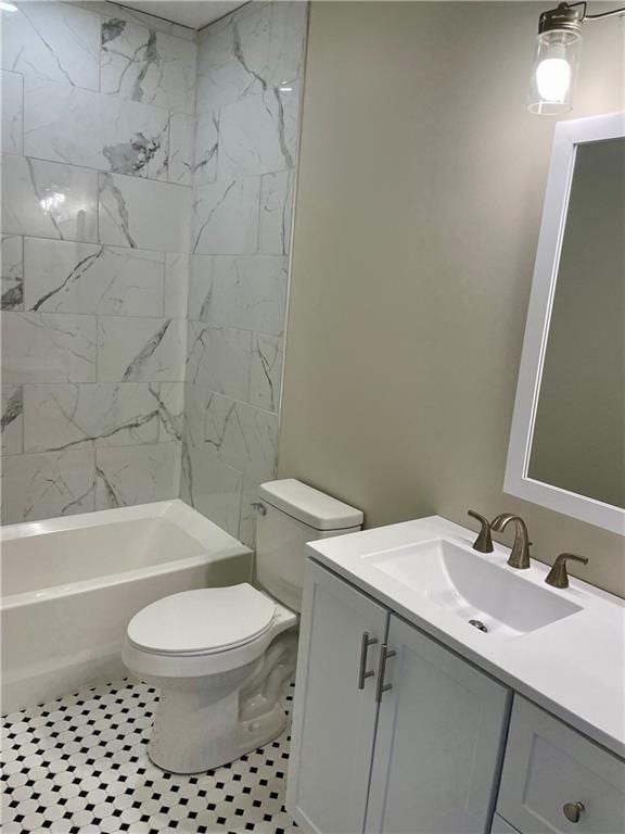 bathroom with vanity, tub / shower combination, tile patterned floors, and toilet
